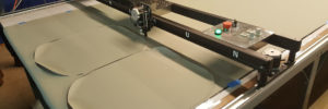 Reupholstering represented by cnc machine cutting commercial furniture vinyl grand rapids MI